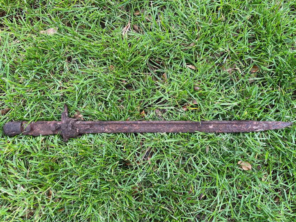 Surprise find in tree stump removal - a WW2 bayonet